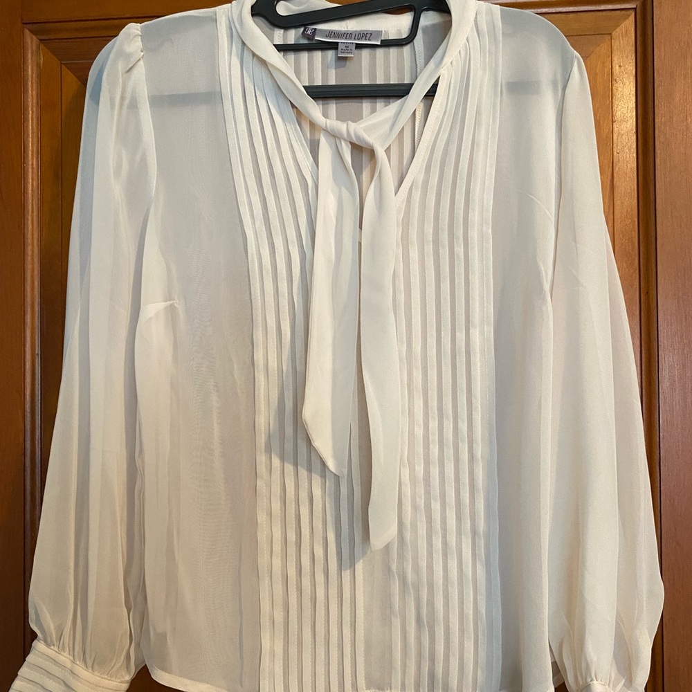 Like new cream sheer long sleeve blouse with neck tie, ribbing front/back, sz MP
